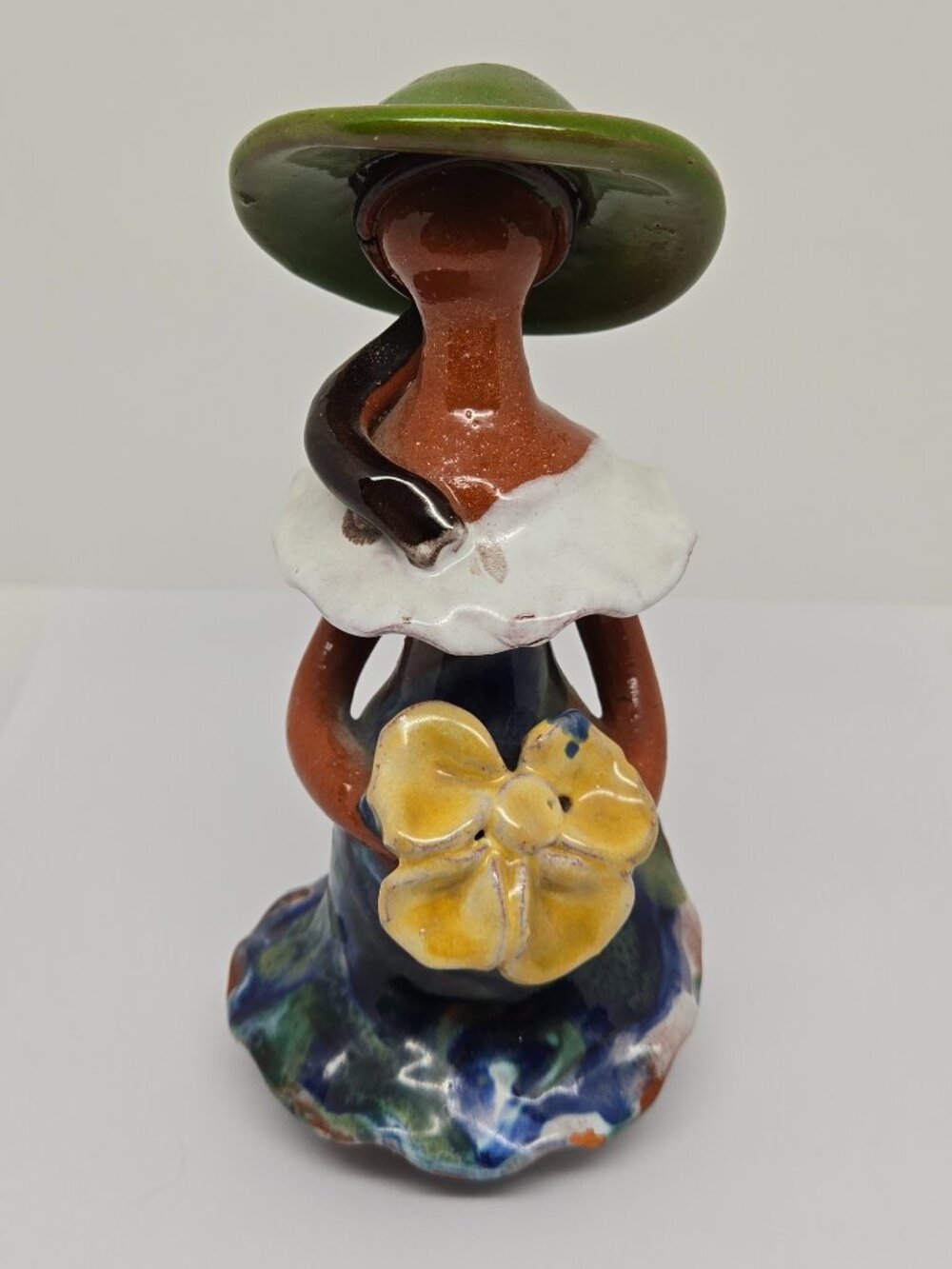 Terracotta Faceless Woman Figurine, Green Hat, Yellow Flower, 6"